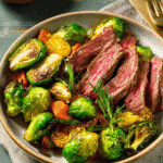 Roasted Brussels sprouts with beef served as a fall vegetable recipe