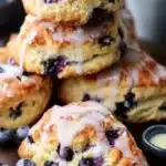 Freshly baked blueberry scones on a plate ready to enjoy