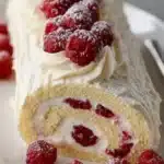 white chocolate raspberry yule log recipe 2025 12 31 210834 574x1024 1